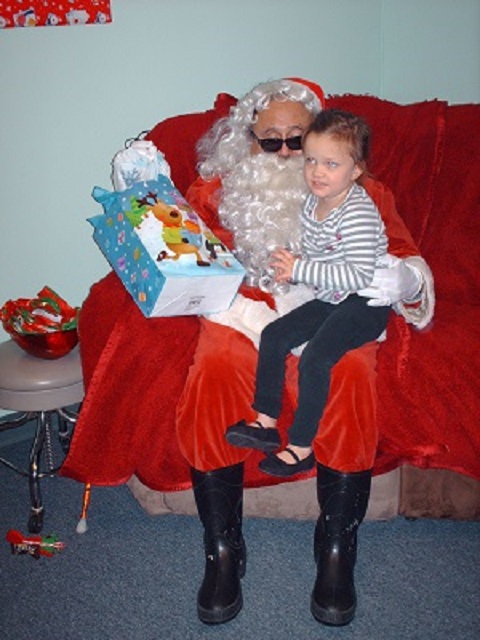 Blind Santa and a little girl